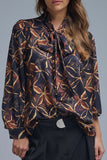 The Q2 Chiffon Blouse with Abstract Print and Bow Detail- Black
