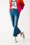 The Q2 Flared Skinny Jeans with Raw Edge - Mid Wash
