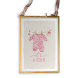 Baby Girl Clothing with “It's a Girl” Dishtowel